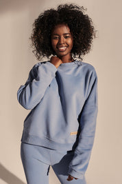 BLUZA O KROJU REGULAR FIT Z DŁUŻSZYM TYŁEM NIEBIESKA - COOK