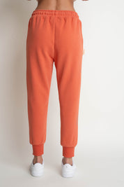 ORANGE JOGGER TROUSERS - BEGERA