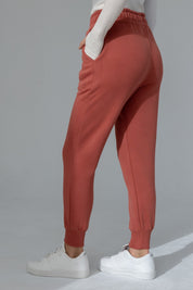 ORANGE JOGGER TROUSERS - BEGERA