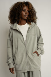 BLUZA OVERSIZE Z KAPTUREM Z EFEKTEM WASHED OLIWKOWA - TRONDHEIM