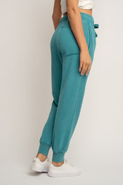 SPODNIE DRESOWE TYPU JOGGER Z EFEKTEM WASHED TURKUSOWE - ODENSE