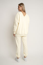 BLUZA Z DEKOLTEM OVERSIZE KREMOWA - BISCOE