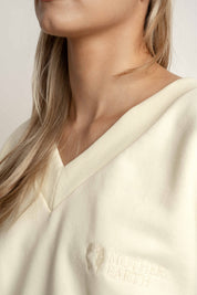 BLUZA Z DEKOLTEM OVERSIZE KREMOWA - BISCOE