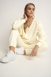 BLUZA Z DEKOLTEM OVERSIZE KREMOWA - BISCOE