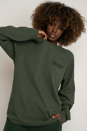 LONGSLEEVE OVERSIZE Z DELIKATNYM EFEKTEM SPRANIA ZIELONY - OBILATU