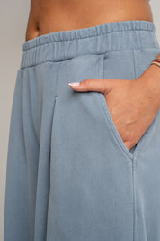 SPODNIE DRESOWE O KROJU BALLOON FIT Z EFEKTEM WASHED NIEBIESKIE - RIBE TALL