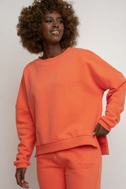 BLUZA O KROJU REGULAR FIT Z DŁUŻSZYM TYŁEM PUMPKIN POMARAŃCZOWA - COOK