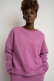 BLUZA O KROJU REGULAR FIT Z DŁUŻSZYM TYŁEM CUKIERKOWY RÓŻ - COOK