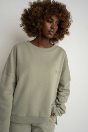 BLUZA O KROJU REGULAR FIT Z DŁUŻSZYM TYŁEM OLIWKOWA - COOK