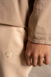 T-SHIRT OVERSIZE Z DELIKATNYM EFEKTEM SPRANIA BEŻOWY - TOBALAI