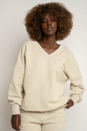 BLUZA Z DEKOLTEM OVERSIZE JASNOBEŻOWA - BISCOE