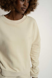 BLUZA O KROJU REGULAR FIT Z DŁUŻSZYM TYŁEM JASNOBEŻOWA - COOK