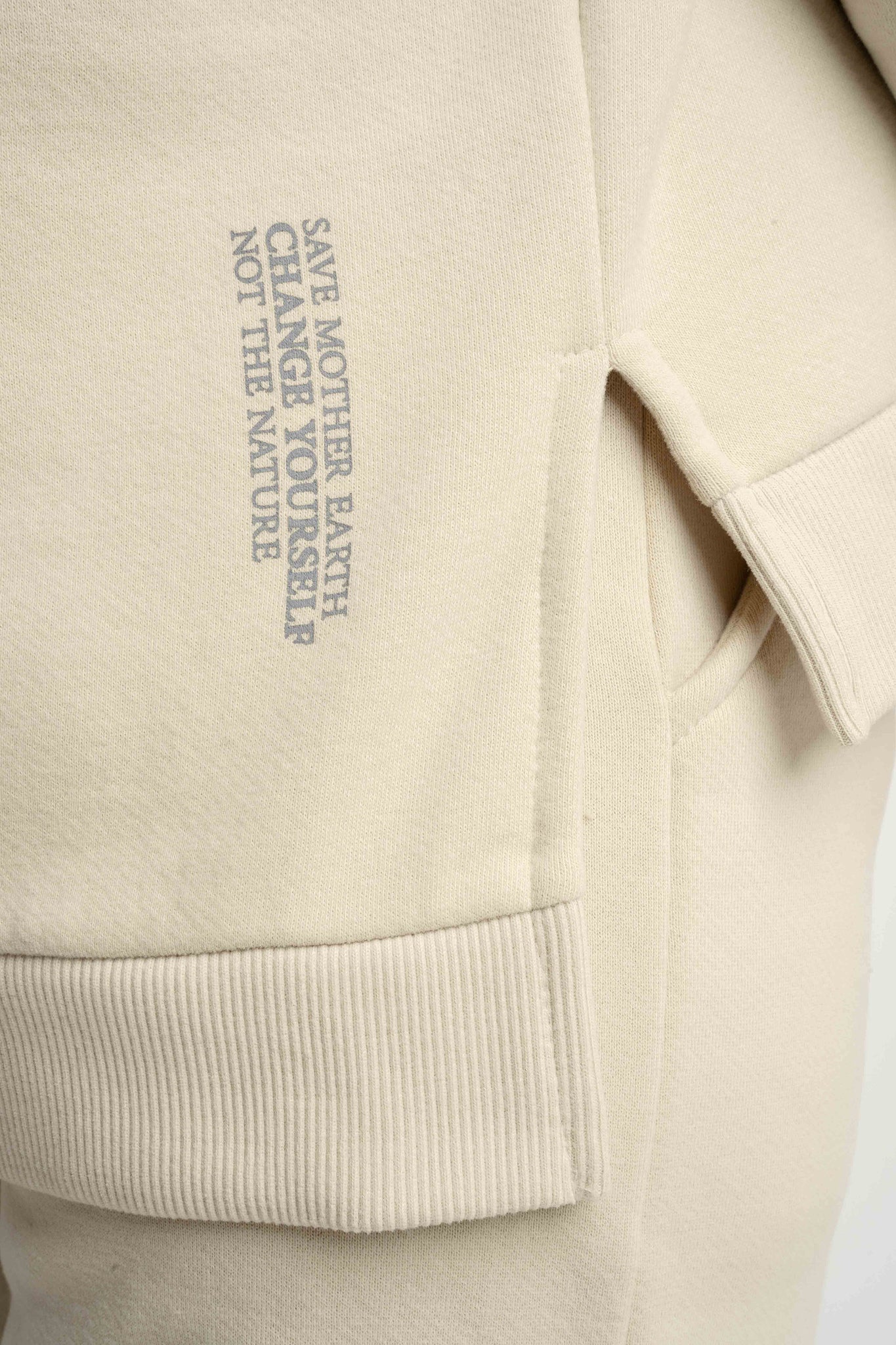 BLUZA O KROJU REGULAR FIT Z DŁUŻSZYM TYŁEM JASNOBEŻOWA - COOK