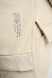 BLUZA O KROJU REGULAR FIT Z DŁUŻSZYM TYŁEM JASNOBEŻOWA - COOK