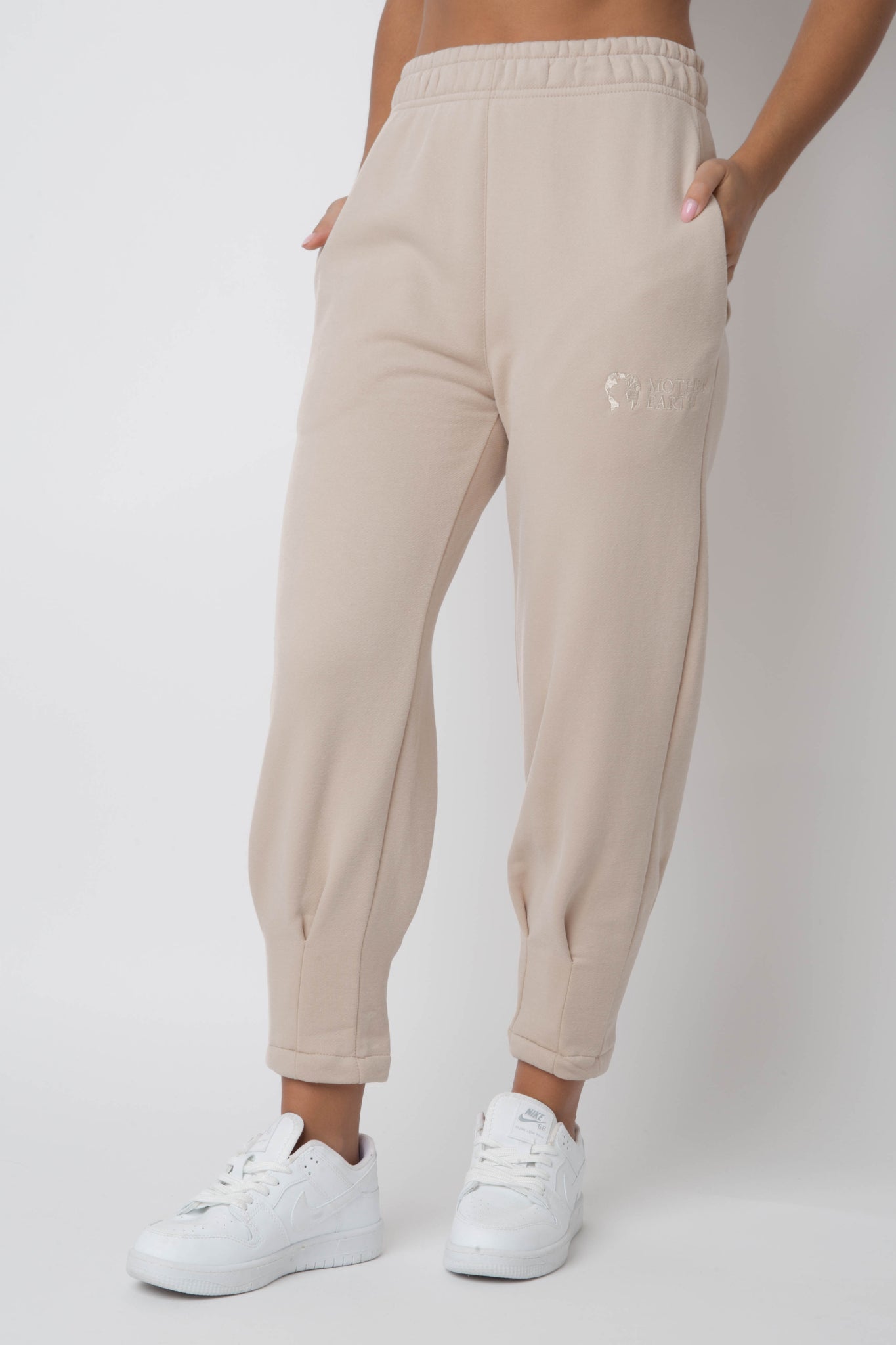 WOMEN'S SWEATPANTS WITH STITCHING ON THE LEGS, BEIGE - ANACAPA