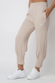 WOMEN'S SWEATPANTS WITH STITCHING ON THE LEGS, BEIGE - ANACAPA