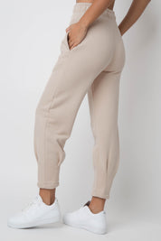 WOMEN'S SWEATPANTS WITH STITCHING ON THE LEGS, BEIGE - ANACAPA