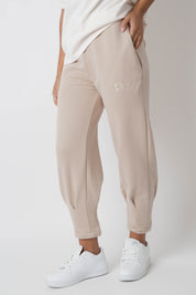 WOMEN'S SWEATPANTS WITH STITCHING ON THE LEGS, BEIGE - ANACAPA