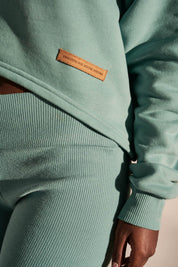 SHORT HOODED SWEATSHIRT TURQUOISE - MAJOTTA